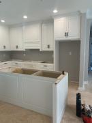 custom-white-kitchen-cabinets-black-hardware